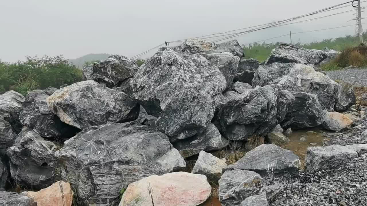 信阳黑山石切片异形制作 花园点缀切片石设计 河南庭院造景石